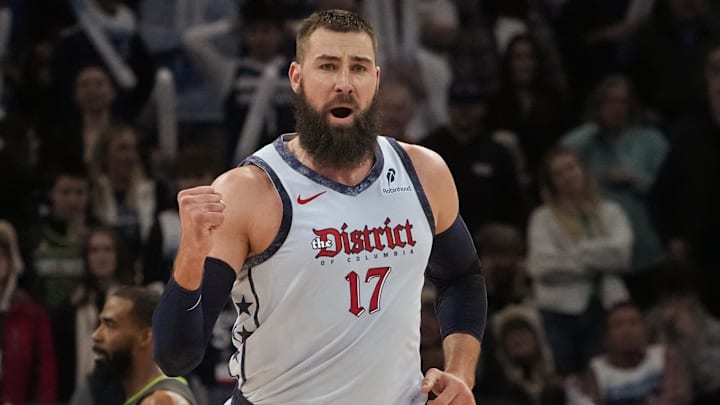 Feb 1, 2025; Minneapolis, Minnesota, USA; Washington Wizards center Jonas Valanciunas (17) celebrates his basket against the Minnesota Timberwolves with less than 20 seconds to go in the fourth quarter at Target Center. Mandatory Credit: Bruce Kluckhohn-Imagn Images