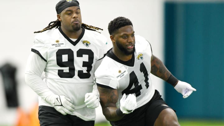 Jacksonville Jaguars defensive end Tyler Lacy (93) and linebacker Josh Allen (41) run into each other during drills. The Jacksonville Jaguars let most of the veterans off from participating in Monday's mandatory minicamp session held in the air conditioned enclosed field at EverBank Stadium's Miller Electric Center in Jacksonville, Fla. June 10, 2024. Jacksonville Jaguars defensive end Tyler Lacy (93) and linebacker Josh Allen (41) run into each other during drills. The Jacksonville Jaguars let most of the veterans off from participating in Monday's mandatory minicamp session held in the air conditioned enclosed field at EverBank Stadium's Miller Electric Center in Jacksonville, Fla. June 10, 2024.