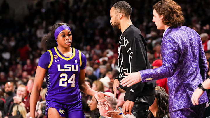Jan 24, 2025; Columbia, South Carolina, USA; LSU Lady Tigers guard Aneesah Morrow (24) is greeted after fouling out against the South Carolina Gamecocks in the second half at Colonial Life Arena. Mandatory Credit: Jeff Blake-Imagn Images Jan 24, 2025; Columbia, South Carolina, USA; LSU Lady Tigers guard Aneesah Morrow (24) is greeted after fouling out against the South Carolina Gamecocks in the second half at Colonial Life Arena. Mandatory Credit: Jeff Blake-Imagn Images
