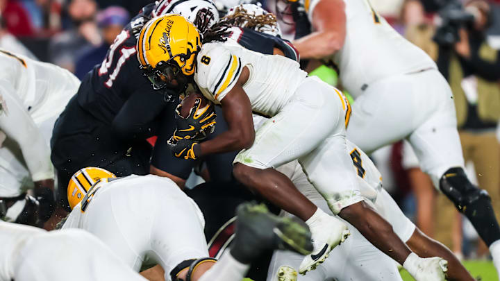 Nov 16, 2024; Columbia, South Carolina, USA; Missouri Tigers running back Nate Noel (8) runs the ball for a touchdown against the South Carolina Gamecocks in the second half at Williams-Brice Stadium. Mandatory Credit: Jeff Blake-Imagn Images Nov 16, 2024; Columbia, South Carolina, USA; Missouri Tigers running back Nate Noel (8) runs the ball for a touchdown against the South Carolina Gamecocks in the second half at Williams-Brice Stadium. Mandatory Credit: Jeff Blake-Imagn Images