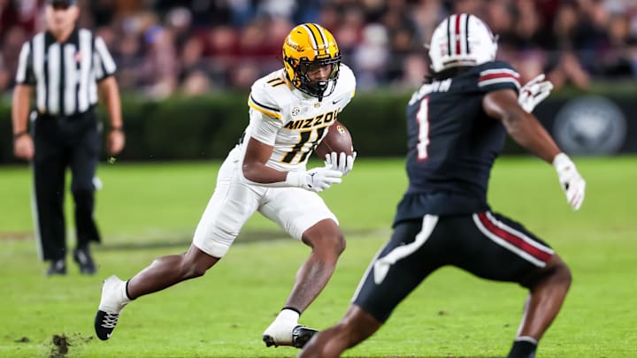 Nov 16, 2024; Columbia, South Carolina, USA; Missouri Tigers running back Kewan Lacy (11) runs the ball against the South Carolina Gamecocks in the second half at Williams-Brice Stadium. Mandatory Credit: Jeff Blake-Imagn Images