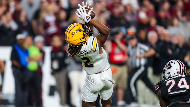 Nov 16, 2024; Columbia, South Carolina, USA; Missouri Tigers wide receiver Marquis Johnson (2) makes a reception over South Carolina Gamecocks defensive back Jalon Kilgore (24) in the second half at Williams-Brice Stadium. Mandatory Credit: Jeff Blake-Imagn Images