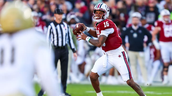 Nov 23, 2024; Columbia, South Carolina, USA; South Carolina Gamecocks quarterback LaNorris Sellers (16) rolls out to pass against the Wofford Terriers in the first quarter at Williams-Brice Stadium. Mandatory Credit: Jeff Blake-Imagn Images Nov 23, 2024; Columbia, South Carolina, USA; South Carolina Gamecocks quarterback LaNorris Sellers (16) rolls out to pass against the Wofford Terriers in the first quarter at Williams-Brice Stadium. Mandatory Credit: Jeff Blake-Imagn Images