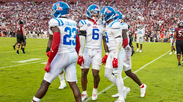 Oct 5, 2024; Columbia, South Carolina, USA; Mississippi Rebels linebacker TJ Dottery (6) celebrates an interception against the South Carolina Gamecocks in the second half at Williams-Brice Stadium. Mandatory Credit: Jeff Blake-Imagn Images