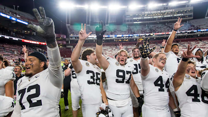 Sep 13, 2025; Columbia, South Carolina, USA; Vanderbilt Commodores players celebrate following their win over the South Carolina Gamecocks at Williams-Brice Stadium. Mandatory Credit: Jeff Blake-Imagn Images