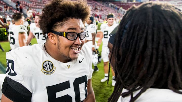Sep 13, 2025; Columbia, South Carolina, USA; Vanderbilt Commodores offensive lineman Chase Mitchell (50) celebrates following their win over the South Carolina Gamecocks at Williams-Brice Stadium. Mandatory Credit: Jeff Blake-Imagn Images Sep 13, 2025; Columbia, South Carolina, USA; Vanderbilt Commodores offensive lineman Chase Mitchell (50) celebrates following their win over the South Carolina Gamecocks at Williams-Brice Stadium. Mandatory Credit: Jeff Blake-Imagn Images