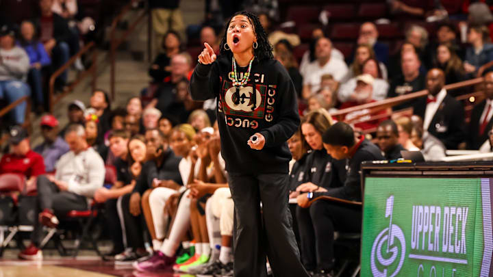 Dec 29, 2024; Columbia, South Carolina, USA; South Carolina Gamecocks head coach Dawn Staley directs her team against the Wofford Terriers in the first half at Colonial Life Arena. Mandatory Credit: Jeff Blake-Imagn Images