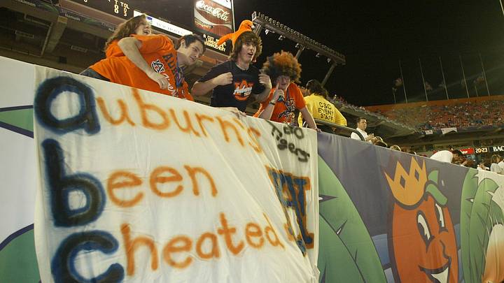 Jan 04, 2005; Miami, FL, USA;  Auburn fans show their displeasure with the way their team was left out of a chance to play for the national title before the start of  the 2005 Orange Bowl between the Oklahoma Sooners and the USC Trojans held at Pro Player Stadium. Mandatory Credit: Photo by Matthew Emmons-USA TODAY Sports (©) Copyright 2005 by Matthew Emmons