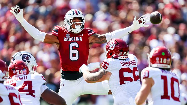 Oct 18, 2025; Columbia, South Carolina, USA; South Carolina Gamecocks defensive end Dylan Stewart (6) attempt to knock down a pass by Oklahoma Sooners quarterback John Mateer (10) in the first quarter at Williams-Brice Stadium. Mandatory Credit: Jeff Blake-Imagn Images Oct 18, 2025; Columbia, South Carolina, USA; South Carolina Gamecocks defensive end Dylan Stewart (6) attempt to knock down a pass by Oklahoma Sooners quarterback John Mateer (10) in the first quarter at Williams-Brice Stadium. Mandatory Credit: Jeff Blake-Imagn Images
