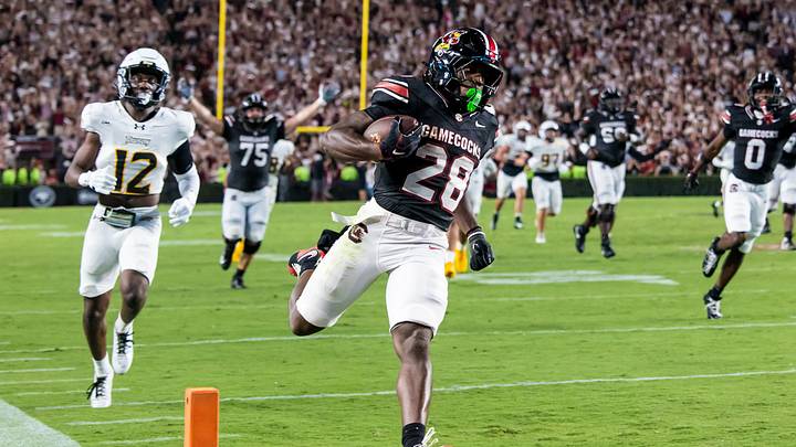 Sep 12, 2026; Columbia, South Carolina, USA;  South Carolina Gamecocks running back Matt Fuller (28) scores on a 58-yard touchdown run in the second quarter at Williams-Brice Stadium.  Mandatory Credit: Jeff Blake-Imagn Images