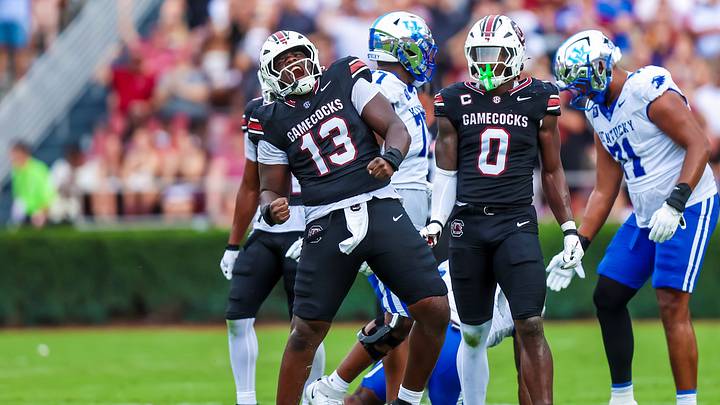 Oct 3, 2026; Columbia, South Carolina, USA; South Carolina Gamecocks defensive lineman Tomiwa Durojaiye (13) celebrates a play against the Kentucky Wildcats in the second quarter at Williams-Brice Stadium. Mandatory Credit: Jeff Blake-Imagn Images Oct 3, 2026; Columbia, South Carolina, USA; South Carolina Gamecocks defensive lineman Tomiwa Durojaiye (13) celebrates a play against the Kentucky Wildcats in the second quarter at Williams-Brice Stadium. Mandatory Credit: Jeff Blake-Imagn Images