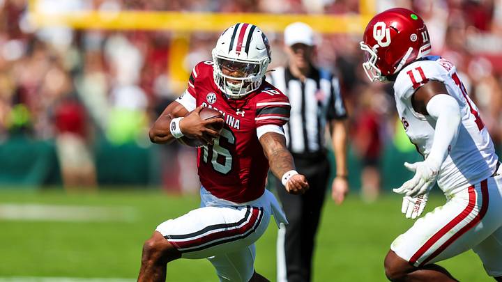 Oct 18, 2025; Columbia, South Carolina, USA; South Carolina Gamecocks quarterback Lanorris Sellers (16) scrambles as Oklahoma Sooners linebacker Kobie McKinzie (11) gives chase in the second quarter at Williams-Brice Stadium. Mandatory Credit: Jeff Blake-Imagn Images Oct 18, 2025; Columbia, South Carolina, USA; South Carolina Gamecocks quarterback Lanorris Sellers (16) scrambles as Oklahoma Sooners linebacker Kobie McKinzie (11) gives chase in the second quarter at Williams-Brice Stadium. Mandatory Credit: Jeff Blake-Imagn Images