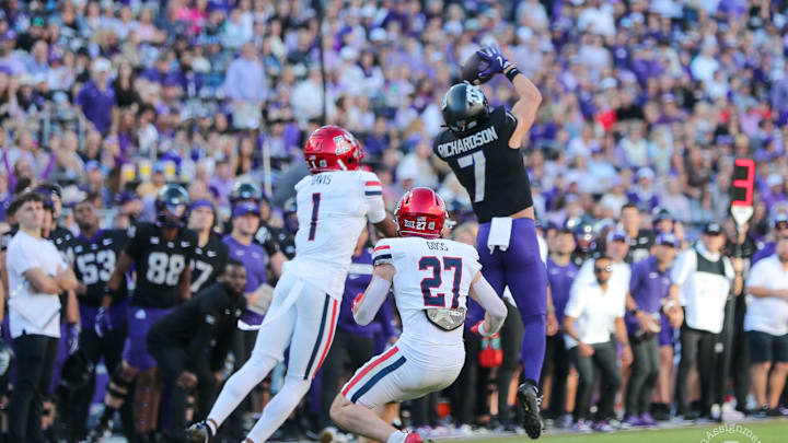 J.P. Richardson leaps up for a catch to set up a TCU touchdown before the half. 
