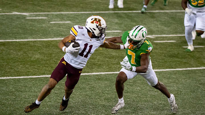 Minnesota wide receiver Javon Tracy, left, outruns Oregon defensive back Ify Obidegwu on his way to a touchdown as the Oregon Ducks host the Minnesota Golden Gophers on Nov. 14, 2025, at Autzen Stadium in Eugene, Oregon. Minnesota wide receiver Javon Tracy, left, outruns Oregon defensive back Ify Obidegwu on his way to a touchdown as the Oregon Ducks host the Minnesota Golden Gophers on Nov. 14, 2025, at Autzen Stadium in Eugene, Oregon.