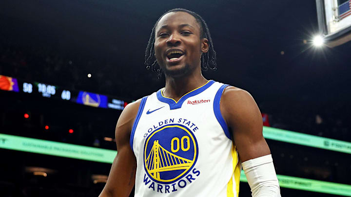 Dec 12, 2023; Phoenix, Arizona, USA; Golden State Warriors forward Jonathan Kuminga (00) celebrates after a play during the third quarter against the Phoenix Suns at Footprint Center. Mandatory Credit: Mark J. Rebilas-Imagn Images