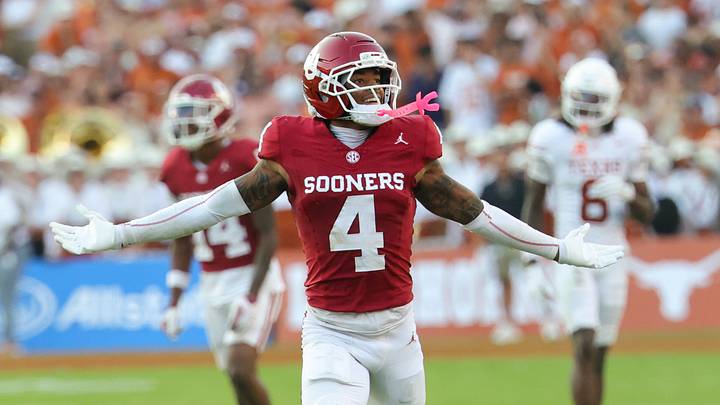 Oklahoma Sooners defensive back Courtland Guillory (4) reacts after making an interception during the second half against the Texas Longhorns at the Cotton Bowl. Mandatory Credit: Kevin Jairaj-Imagn Images Oklahoma Sooners defensive back Courtland Guillory (4) reacts after making an interception during the second half against the Texas Longhorns at the Cotton Bowl. Mandatory Credit: Kevin Jairaj-Imagn Images
