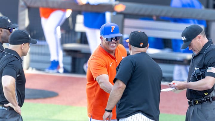 Jun 1, 2024; Stillwater, OK, USA; Florida Head Coach, Kevin OÕSullivan shakes Oklahoma State Head Coach Josh HolidayÕs hand before a NCAA regional baseball game at O'Brate Stadium. Mandatory Credit: Mitch Alcala-The Oklahoman