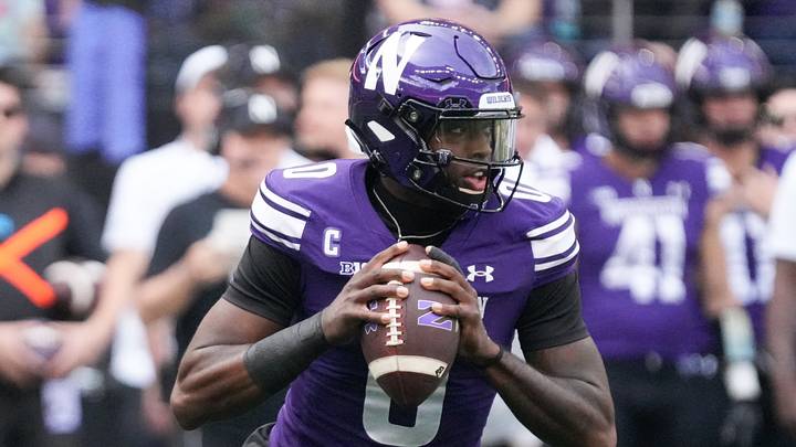 Oct 10, 2026; Evanston, Illinois, USA; Northwestern Wildcats quarterback Aidan Chiles (0) looks to pass against the Ball State Cardinals during the first half at New Ryan Field. Mandatory Credit: David Banks-Imagn Images Oct 10, 2026; Evanston, Illinois, USA; Northwestern Wildcats quarterback Aidan Chiles (0) looks to pass against the Ball State Cardinals during the first half at New Ryan Field. Mandatory Credit: David Banks-Imagn Images