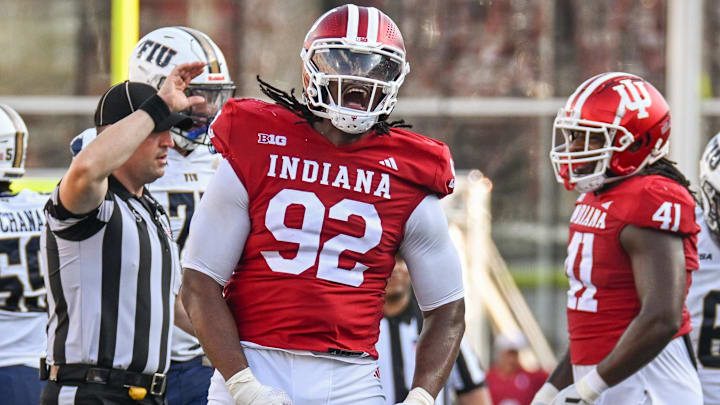 Indiana Hoosiers defensive lineman Marcus Burris Jr. (92) celebrate after a sack against the Florida International Panthers during the second half at Memorial Stadium.