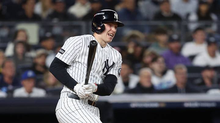 Oct 7, 2026; Bronx, New York, USA; New York Yankees designated hitter Ben Rice (22) hits a RBI single during the third inning against the Tampa Bay Rays in game three of the ALDS for the 2026 MLB Playoffs at Yankee Stadium. Mandatory Credit: Wendell Cruz-Imagn Images Oct 7, 2026; Bronx, New York, USA; New York Yankees designated hitter Ben Rice (22) hits a RBI single during the third inning against the Tampa Bay Rays in game three of the ALDS for the 2026 MLB Playoffs at Yankee Stadium. Mandatory Credit: Wendell Cruz-Imagn Images