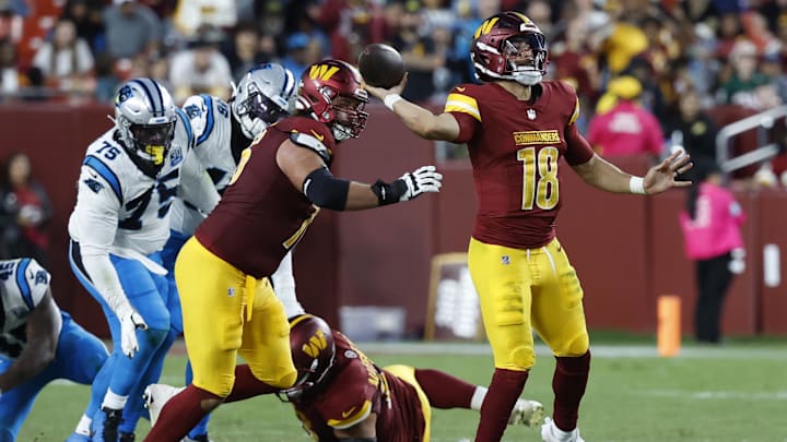 Oct 20, 2024; Landover, Maryland, USA; Washington Commanders quarterback Marcus Mariota (18) passes the ball against the Carolina Panthers during the fourth quarter at Northwest Stadium. Mandatory Credit: Geoff Burke-Imagn Images Oct 20, 2024; Landover, Maryland, USA; Washington Commanders quarterback Marcus Mariota (18) passes the ball against the Carolina Panthers during the fourth quarter at Northwest Stadium. Mandatory Credit: Geoff Burke-Imagn Images