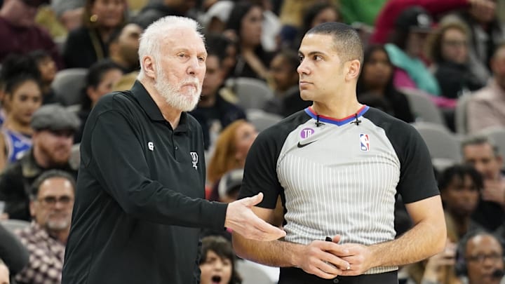 Feb 3, 2023; San Antonio, Texas, USA; San Antonio Spurs head coach Gregg Popovich argues a call with official Mousa Dagher (28) during the second half against the Philadelphia 76ers at AT&T Center. Mandatory Credit: Scott Wachter-Imagn Images