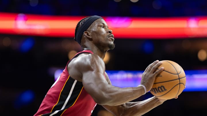 Apr 17, 2024; Philadelphia, Pennsylvania, USA; Miami Heat forward Jimmy Butler (22) lines up a shot against Philadelphia 76ers- Bill Streicher/USA TODAY Sports