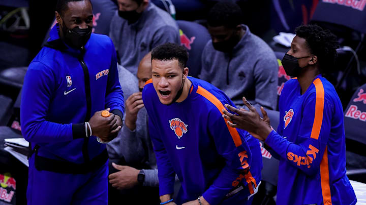 Apr 14, 2021; New Orleans, Louisiana, USA;  New York Knicks forward Kevin Knox II (20) reacts to a play from the bench against New Orleans Pelicans during the second half at the Smoothie King Center. Mandatory Credit: Stephen Lew-Imagn Images