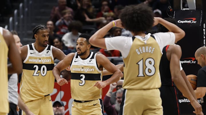 Dec 26, 2025; Washington, District of Columbia, USA; Washington Wizards guard CJ McCollum (3) celebrates after scoring while being fouled against the Toronto Raptors in the first half at Capital One Arena. Mandatory Credit: Geoff Burke-Imagn Images