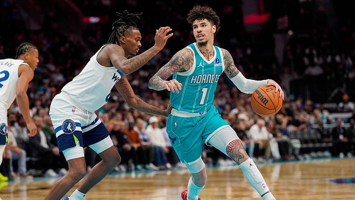 Nov 1, 2025; Charlotte, North Carolina, USA; Charlotte Hornets guard LaMelo Ball (1) handles the ball against Minnesota Timberwolves guard Bones Hyland (8) during the second quarter at Spectrum Center. Mandatory Credit: Jim Dedmon-Imagn Images Nov 1, 2025; Charlotte, North Carolina, USA; Charlotte Hornets guard LaMelo Ball (1) handles the ball against Minnesota Timberwolves guard Bones Hyland (8) during the second quarter at Spectrum Center. Mandatory Credit: Jim Dedmon-Imagn Images
