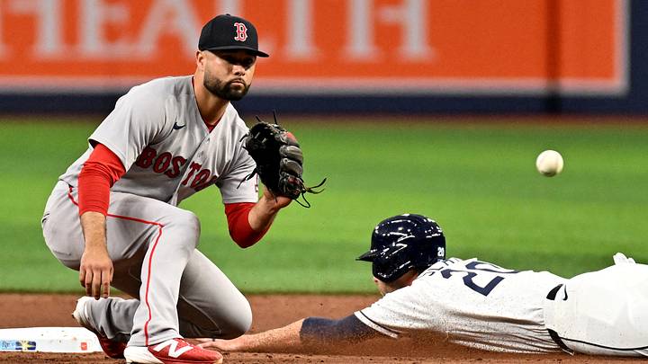 Jun 8, 2026; St. Petersburg, Florida, USA; Boston Red Sox second baseman Isiah Kiner-Falefa (2) waits for the ball as Tampa Bay Rays left fielder Andrew Slater (20) slides in the fifth inning at Tropicana Field. Mandatory Credit: Jonathan Dyer-Imagn Images Jun 8, 2026; St. Petersburg, Florida, USA; Boston Red Sox second baseman Isiah Kiner-Falefa (2) waits for the ball as Tampa Bay Rays left fielder Andrew Slater (20) slides in the fifth inning at Tropicana Field. Mandatory Credit: Jonathan Dyer-Imagn Images