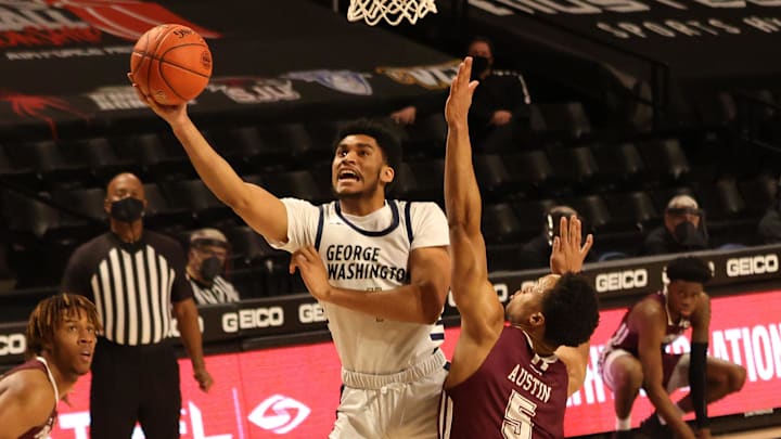 Mar 6, 2021; Richmond, Virginia, USA; George Washington Colonials forward Ricky Lindo Jr. (4) shoots