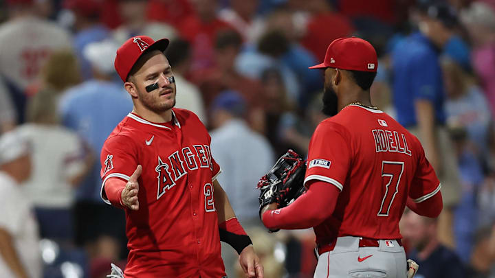 Jul 18, 2025; Philadelphia, Pennsylvania, USA; Los Angeles Angels Mike Trout (27) and outfielder Jo Adell (7) shake hands after a victory against the Philadelphia Phillies at Citizens Bank Park. Mandatory Credit: Bill Streicher-Imagn Images Jul 18, 2025; Philadelphia, Pennsylvania, USA; Los Angeles Angels Mike Trout (27) and outfielder Jo Adell (7) shake hands after a victory against the Philadelphia Phillies at Citizens Bank Park. Mandatory Credit: Bill Streicher-Imagn Images