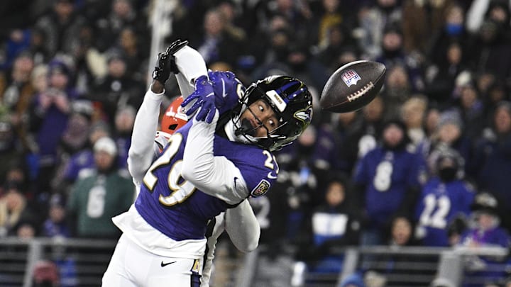 Jan 4, 2025; Baltimore, Maryland, USA;  Baltimore Ravens safety Ar'Darius Washington (29) breaks up a pass intended for Cleveland Browns wide receiver Jerry Jeudy (3) in the end zone at M&T Bank Stadium. Mandatory Credit: Tommy Gilligan-Imagn Images