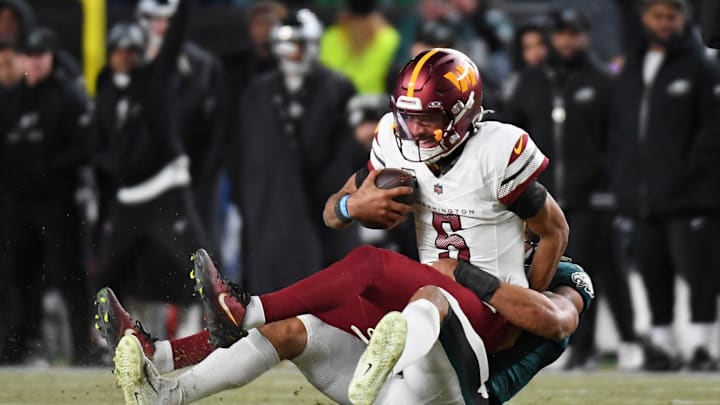 Jan 26, 2025; Philadelphia, PA, USA; Philadelphia Eagles linebacker Nolan Smith Jr. (3) sacks Washington Commanders quarterback Jayden Daniels (5) during the second half in the NFC Championship game at Lincoln Financial Field. Mandatory Credit: Eric Hartline-Imagn Images