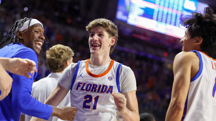 Florida forward Alex Condon (21) celebrates with the bench during the second half of an NCAA mens basketball game at Steven C. O'Connell Center Exactek arena in Gainesville, FL on Tuesday, March 3, 2026. [Alan Youngblood/Gainesville Sun]