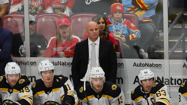 Oct 8, 2024; Sunrise, Florida, USA; Boston Bruins head coach Jim Montgomery looks on from the bench against the Florida Panthers during the third period at Amerant Bank Arena. Mandatory Credit: Sam Navarro-Imagn Images