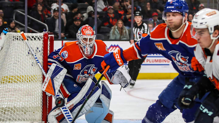 Bakersfield goaltender Olivier Rodrigue (33) keeps his eyes on the puck during the third period of