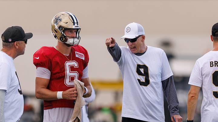Aug 08, 2026; Metairie, LA, USA; New Orleans Saints quarterback Tyler Shough (6) gets direction from offensive coordinator Doug Nussmeier during training camp at Ochsner Sports Performance Center. Mandatory Credit: Stephen Lew-Imagn Images Aug 08, 2026; Metairie, LA, USA; New Orleans Saints quarterback Tyler Shough (6) gets direction from offensive coordinator Doug Nussmeier during training camp at Ochsner Sports Performance Center. Mandatory Credit: Stephen Lew-Imagn Images