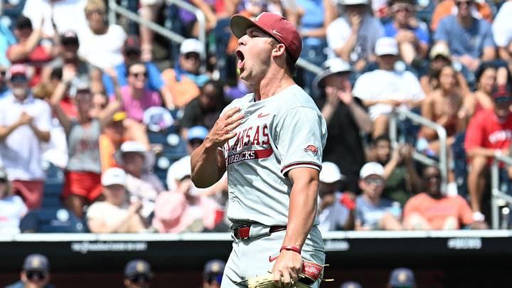Jun 16, 2025; Omaha, Neb, USA; Arkansas Razorbacks starting pitcher Gage Wood (14) celebrates at the end of the eighth inning against the Murray State Racers at Charles Schwab Field. Mandatory Credit: Steven Branscombe-Imagn Images