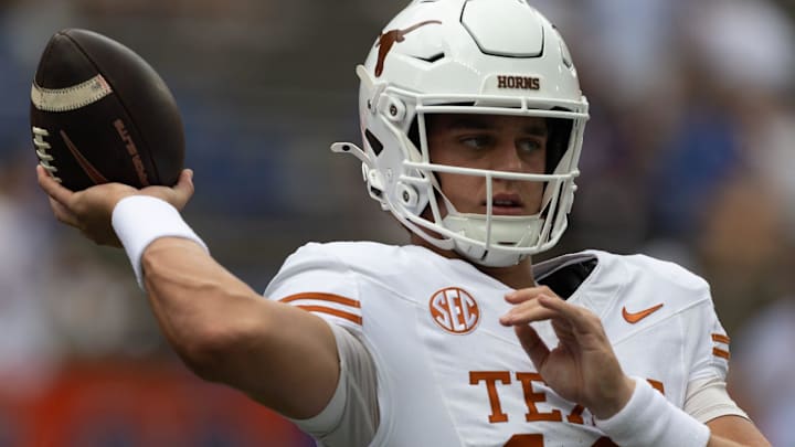 Texas Longhorns quarterback Arch Manning warms up before an NCAA football game against Florida in Gainesville, FL.