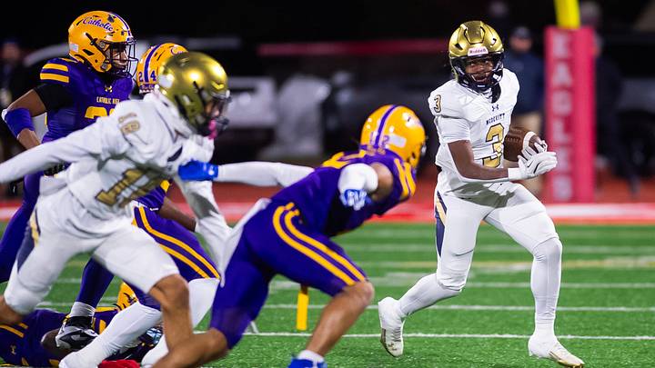 Bishop McDevitt's Jerome Larue Jr. (3) runs to the outside during the PIAA Class 5A football championship game against Roman Catholic at Cumberland Valley High School, Friday, Dec. 5, 2025, in Mechanicsburg, Pa.