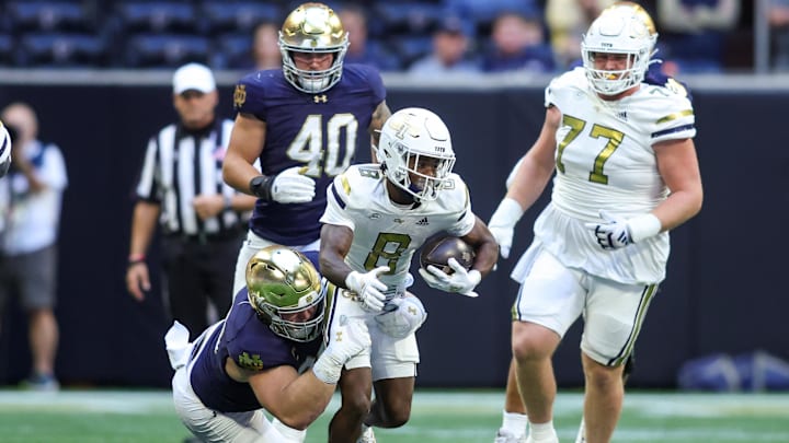Oct 19, 2024; Atlanta, Georgia, USA; Georgia Tech Yellow Jackets wide receiver Malik Rutherford (8) runs after a catch against the Notre Dame Fighting Irish in the first quarter at Mercedes-Benz Stadium. Mandatory Credit: Brett Davis-Imagn Images Oct 19, 2024; Atlanta, Georgia, USA; Georgia Tech Yellow Jackets wide receiver Malik Rutherford (8) runs after a catch against the Notre Dame Fighting Irish in the first quarter at Mercedes-Benz Stadium. Mandatory Credit: Brett Davis-Imagn Images