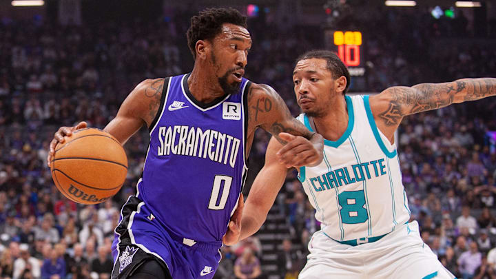 Feb 24, 2025; Sacramento, California, USA; Sacramento Kings guard Malik Monk (0) drives to the basket during the first quarter against the Charlotte Hornets at Golden 1 Center. Mandatory Credit: Ed Szczepanski-Imagn Images