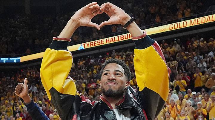 Former Iowa State and Indiana Packer guard Tyrese Haliburton shows heart sign as the unveiling his Olympic 24 gold made banner during the halftime of Cyclones and Wildcats men’s basketball showdown at Hilton Coliseum on Saturday March 1, 2025 in Ames, Iowa.