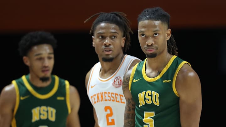 Dec 31, 2024; Knoxville, Tennessee, USA; Tennessee Volunteers guard Chaz Lanier (2) and Norfolk State Spartans guard Brian Moore Jr. (5) during the second half at Thompson-Boling Arena at Food City Center. Mandatory Credit: Randy Sartin-Imagn Images