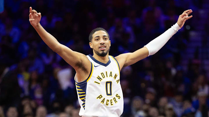 Nov 14, 2023; Philadelphia, Pennsylvania, USA; Indiana Pacers guard Tyrese Haliburton (0) reacts to a three pointer against the Philadelphia 76ers during the fourth quarter at Wells Fargo Center. Mandatory Credit: Bill Streicher-Imagn Images