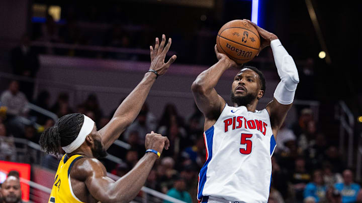 Nov 29, 2024; Indianapolis, Indiana, USA; Detroit Pistons guard Malik Beasley (5) shoots the ball while Indiana Pacers forward Pascal Siakam (43) defends in the second half  at Gainbridge Fieldhouse. Mandatory Credit: Trevor Ruszkowski-Imagn Images
