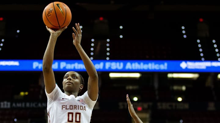 Florida State Seminoles guard Ta'Niya Latson (00) shoots for two. The Florida State Seminoles