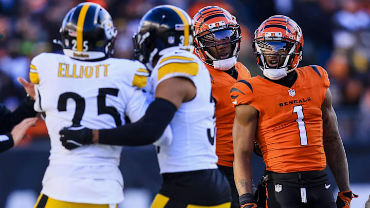 Dec 1, 2024; Cincinnati, Ohio, USA; Cincinnati Bengals wide receiver Ja'Marr Chase (1) talks with Pittsburgh Steelers safety DeShon Elliott (25) after a play in the second half at Paycor Stadium. Mandatory Credit: Katie Stratman-Imagn Images